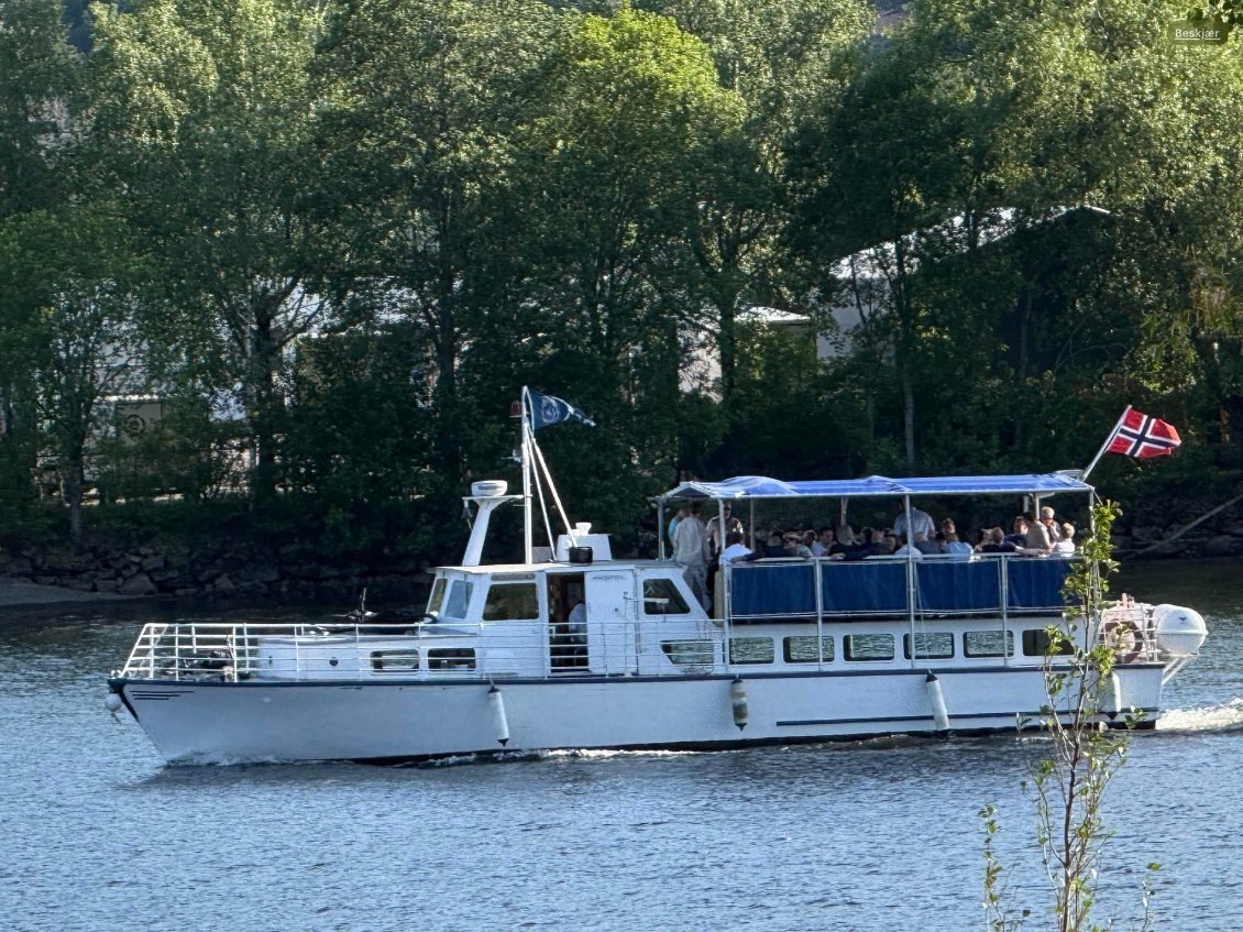 Elvecruise og guidet tur med MS Drammen og Drammen Guideforening
